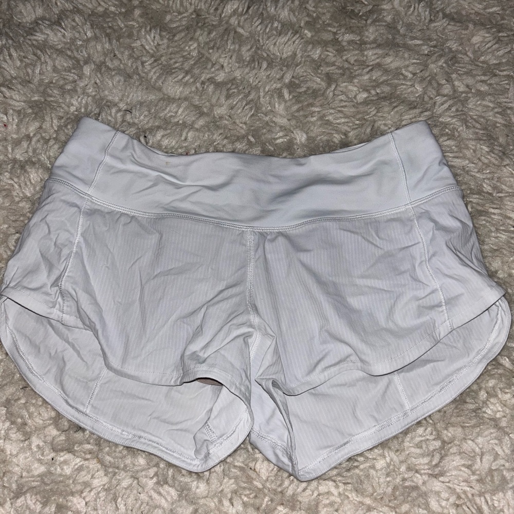white lululemon shorts